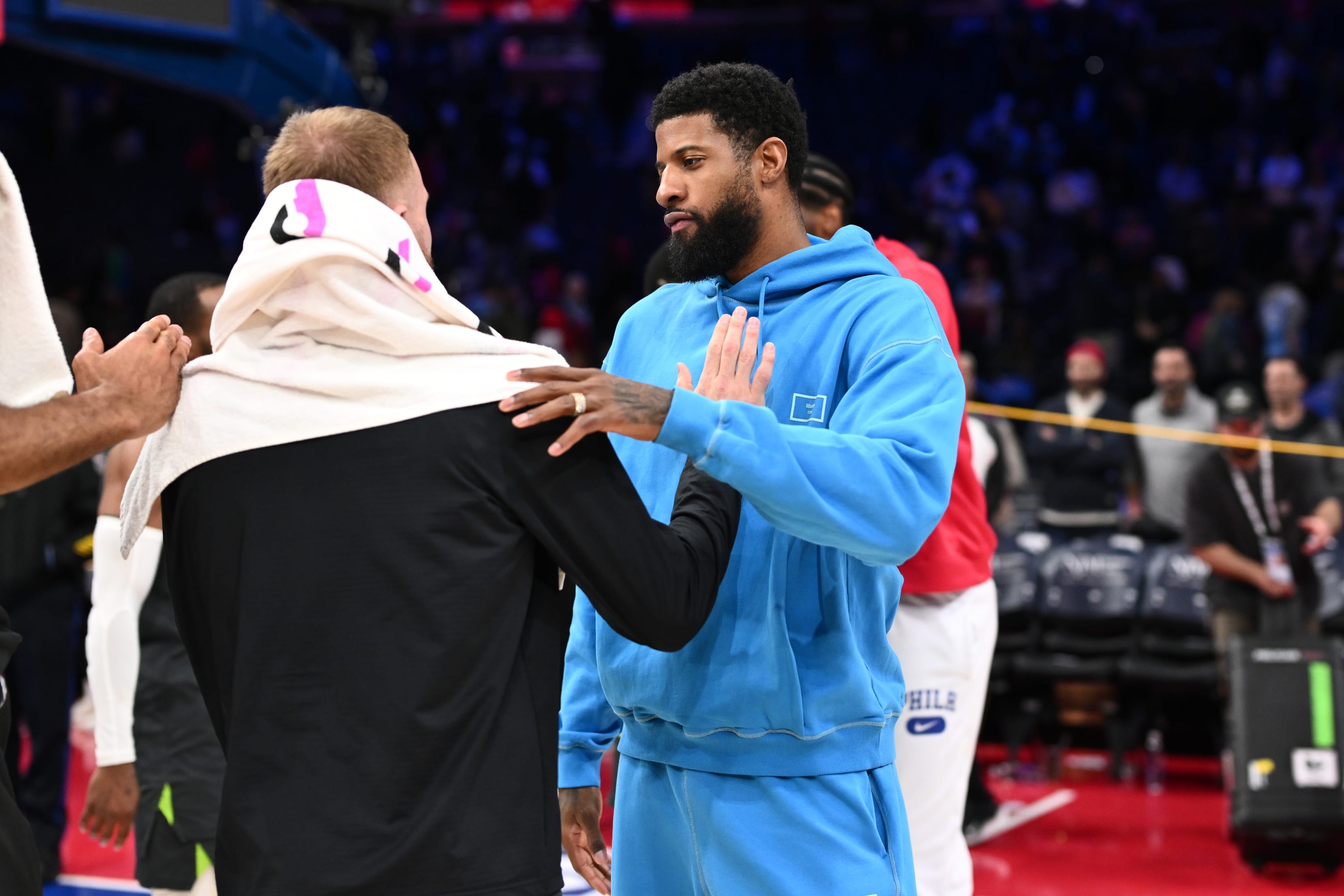 Paul George in street clothes.